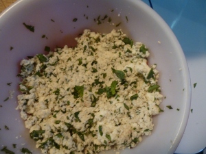 The final product! We mixed in fresh, chopped basil leaves and red pepper flakes to make a spread!